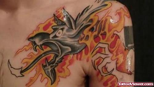 Terrific Fire and Flame Tattoo On Chest And Shoulder
