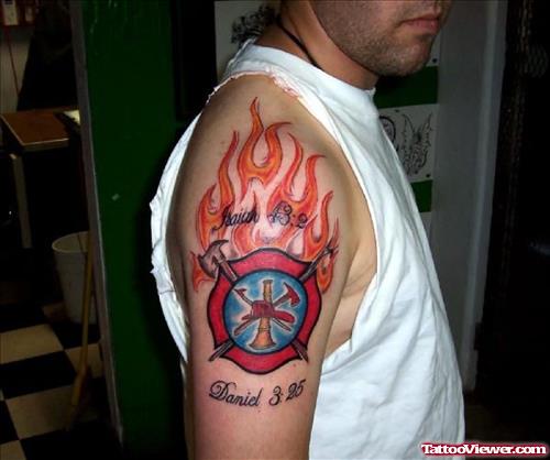 Danied Fire And Flame Tattoo On Shoulder