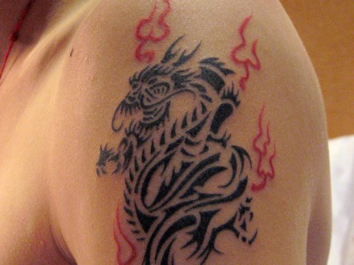 Tribal Dragon Fire Flame Tattoo On Left Shoulder