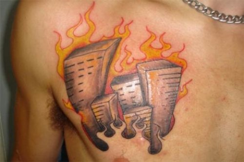 Flaming Buildings Tattoo On Chest