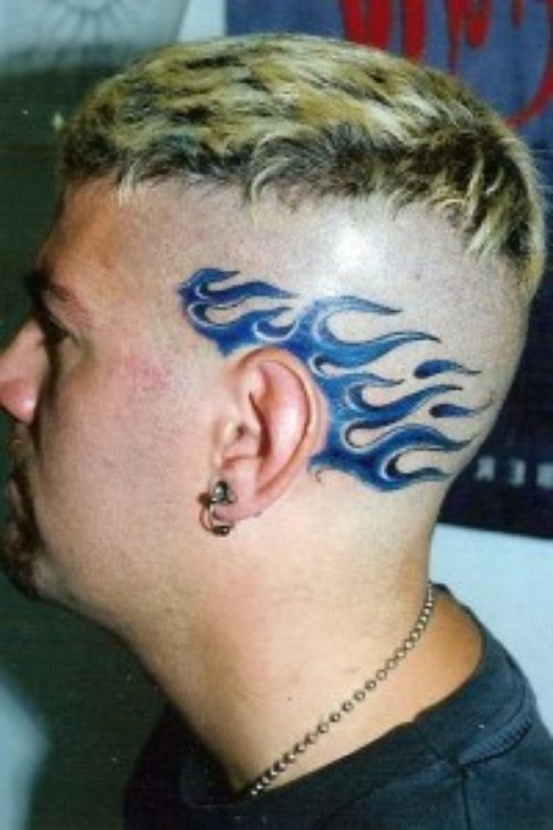Blue Ink Fire And Flame Tattoo On Head