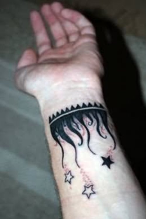 Stars and Fire And Flame Tattoo On Wrist
