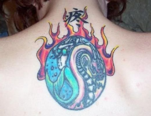 Flaming Yin Yang Tattoo On Upperback