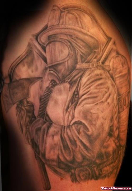 Grey Ink Firefighter Tattoo On Shoulder