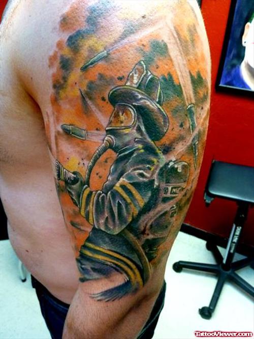 Firefighter Tattoo On Left Half Sleeve