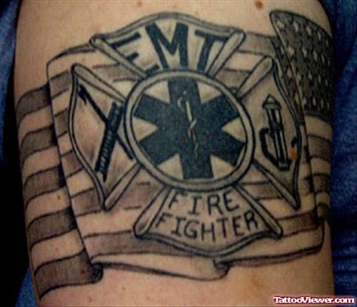 Ems Fire Fighter Tattoo On Biceps