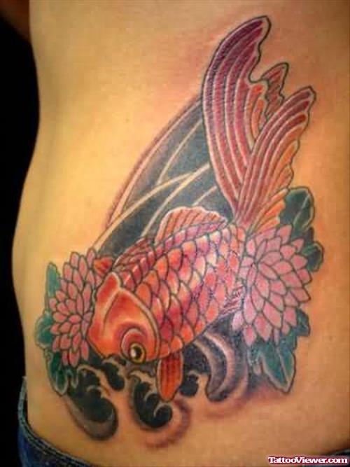 Beautiful Fish Tattoo With Flower
