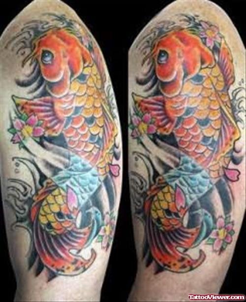 Koi Fish Tattoos On His Arm