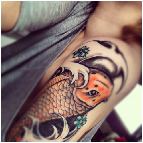 Colored Koi Fish Tattoo On Left Shoulder