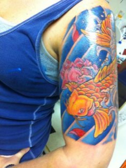 Color Flower And Fish Tattoo On Left Half Sleeve