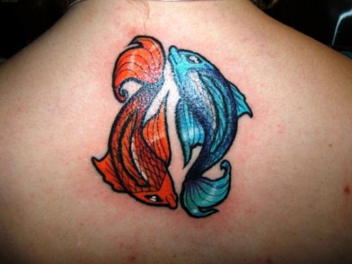 Orange And Blue Fish Tattoo On Upper Back
