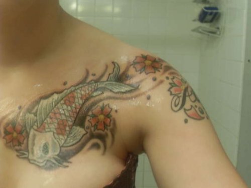 Flowers And Fish Tattoo on Left Collarbone