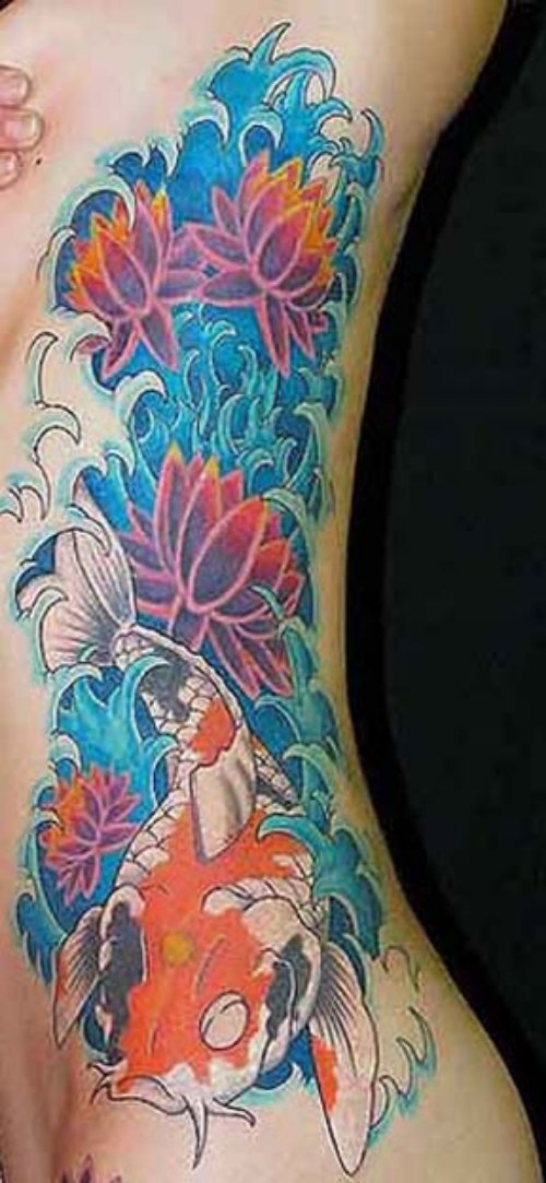 Beautiful Colored Flowers and Fish Tattoo On Side Rib