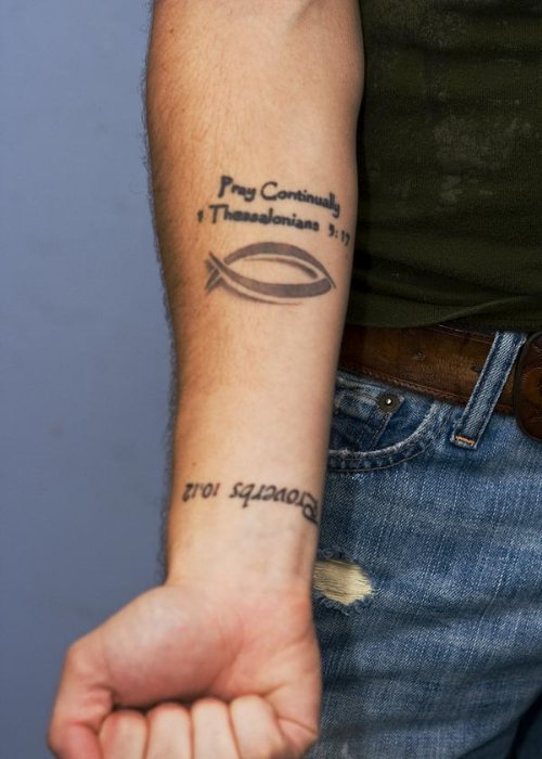 Grey Ink Jesus Fish Tattoo On Right Forearm