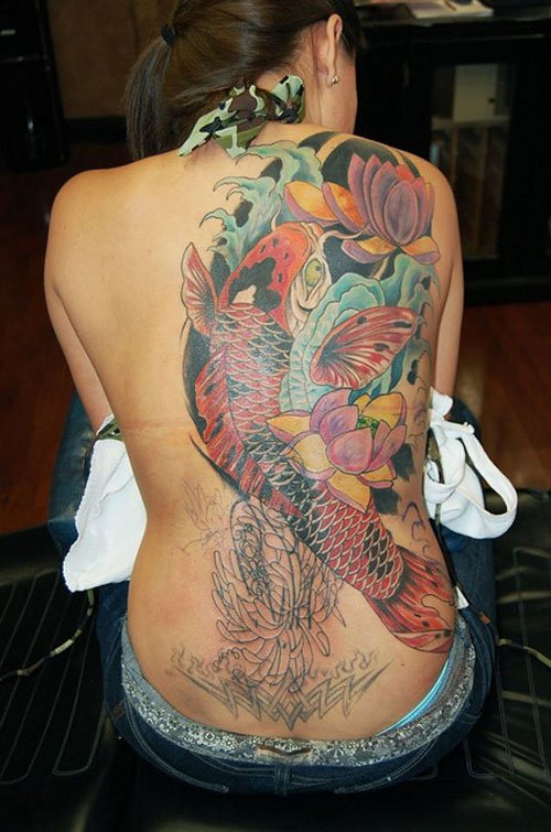 Colored Fish Tattoo On Girl Back