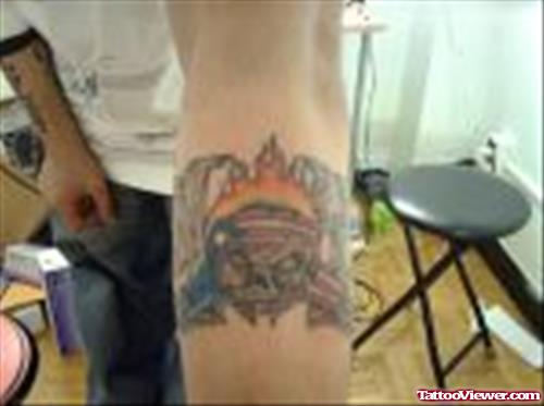 Skull and Flag Tattoo On Arm
