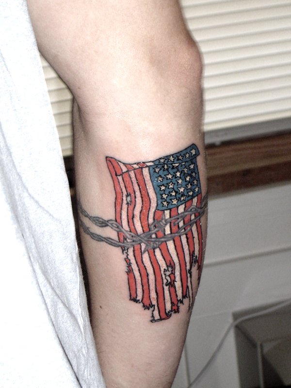 Tattered Flag Tattoo On Leg