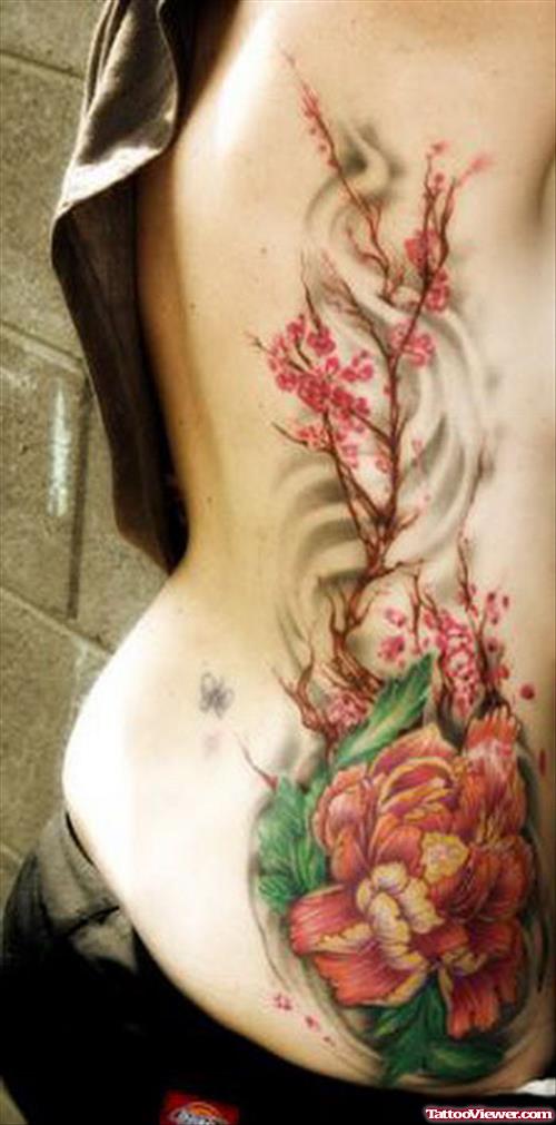 Women Rib Hawaiian Flower Tattoo