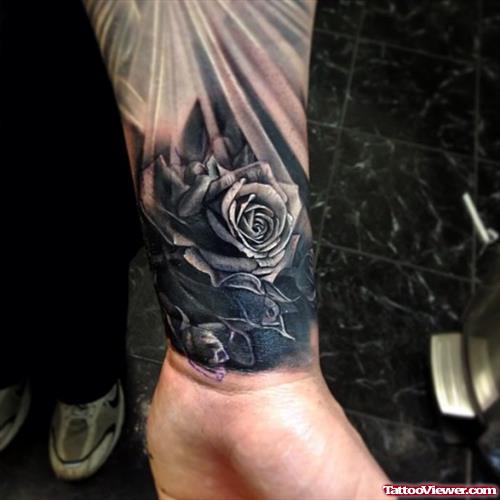 Grey Ink Flower Tattoo On Wrist
