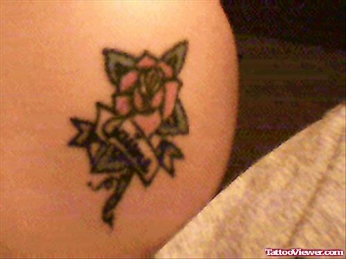 Small Red Flower Tattoo On Shoulder
