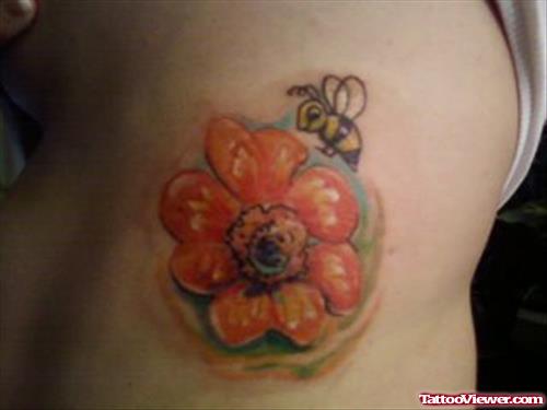 Color Flower And Bee Tattoo On Side Rib