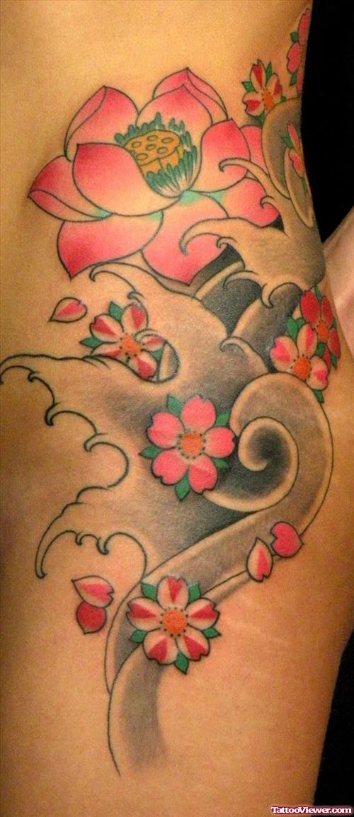 Japanese Flowers Tattoo On Side Rib