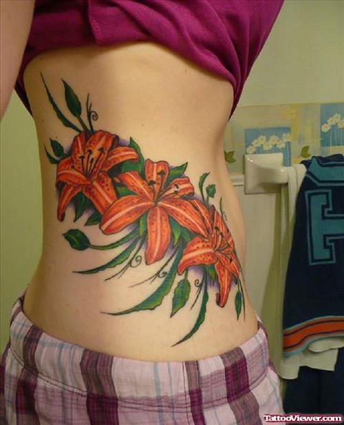 Hawaiian Flowers Tattoos On Side Rib For Girls