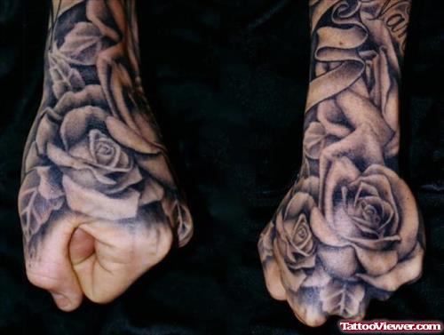 Grey Ink Rose Flower Tattoo On Left Hand