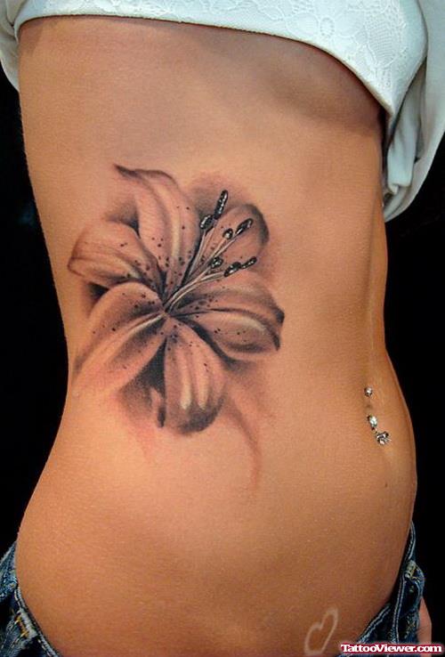 Grey Ink Lily Flower Tattoo On Side Rib