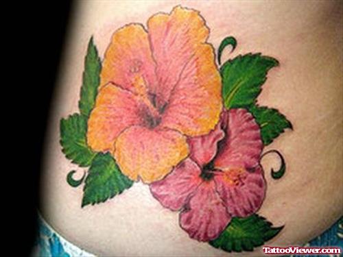 Colored Hibiscus Flowers Tattoos On Side Rib