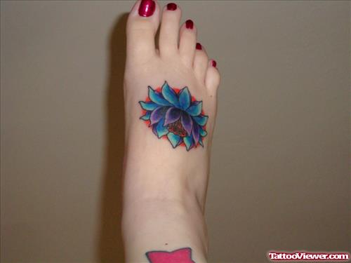 Blue Flower Tattoo On Right Foot