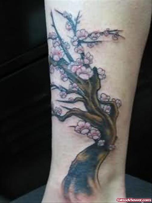 Flowers Tree Tattoo On Leg