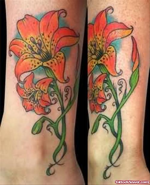 Orange Lily Flower Tattoo On Ankle