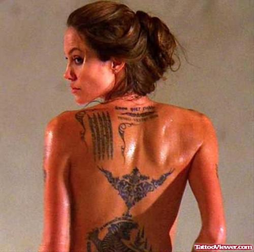 Angelina Flower Tattoo On Back