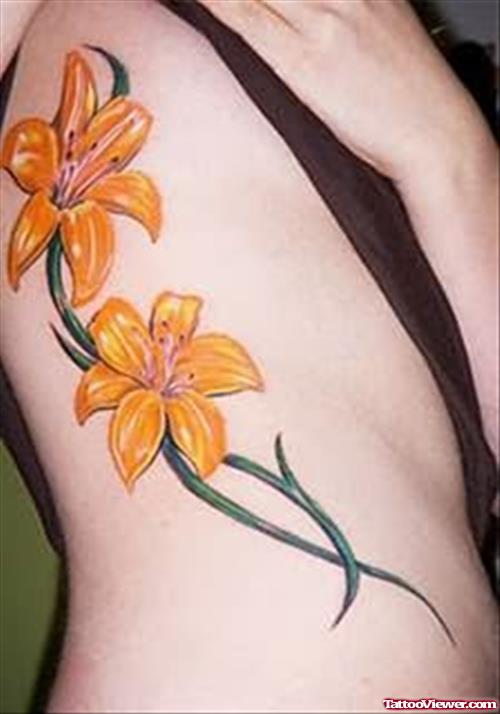 Lily Flower Tattoos On Rib