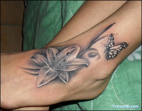 Grey Ink Butterfly And Flower Tattoo On Left Foot