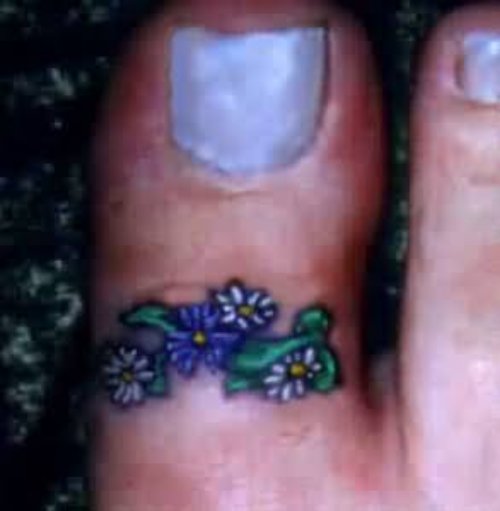 Little Flower Tattoo On Finger of Food
