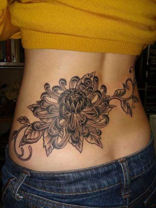 Grey Flower Tattoo On Girl Lowerback