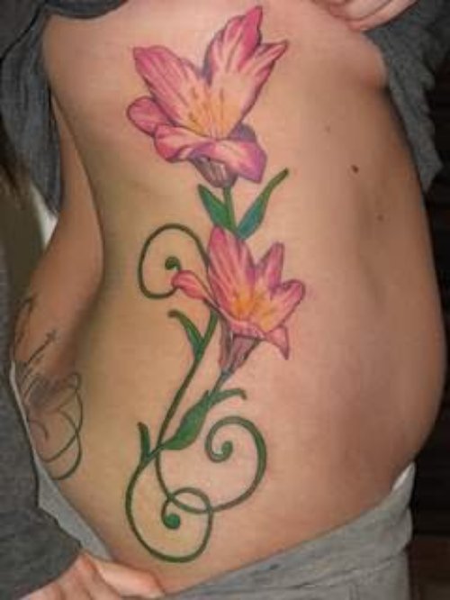 Lilly Flower Tattoo On Rib
