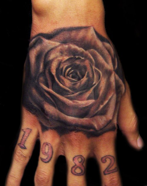 Grey Ink Rose Flower Tattoo On Right Hand