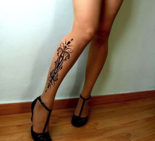 Tribal Flower Tattoo On Right Leg