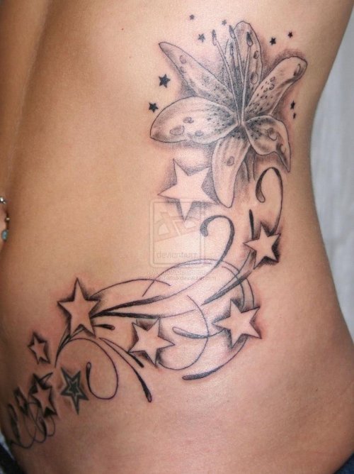Stars And Grey Ink Flower Tattoo On Side