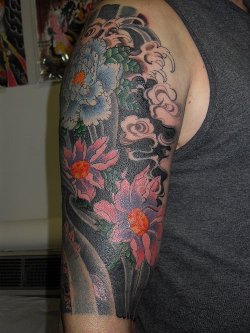 Flower Tattoos On Right Half Sleeve