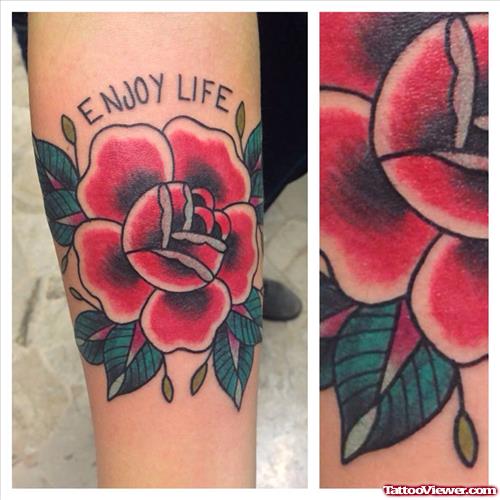 enjoy life - red flower on wrist