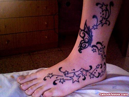 Butterfly And Stars Foot Tattoo