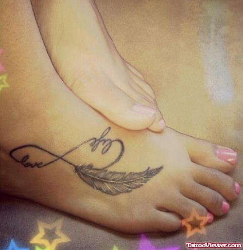 Grey Ink Feather And Infinty Foot Tattoo For Girls