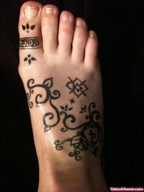 Amazing Black Ink Right Foot Tattoo