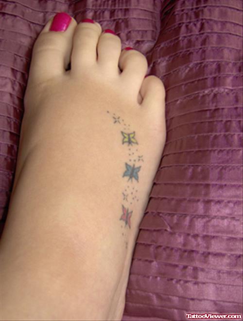 Small Colored Butterflies Foot Tattoo