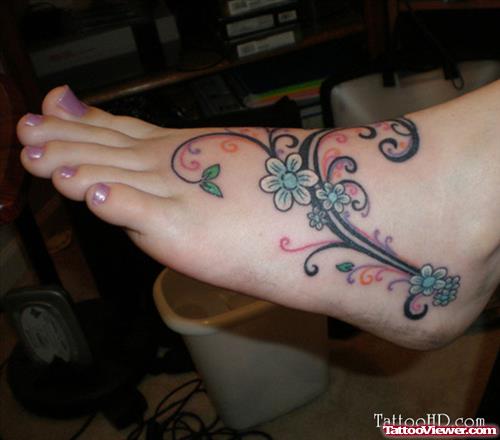 Colored Flowers Foot Tattoo For Girls