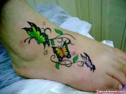 Awesome Colored Butterlies Foot Tattoo